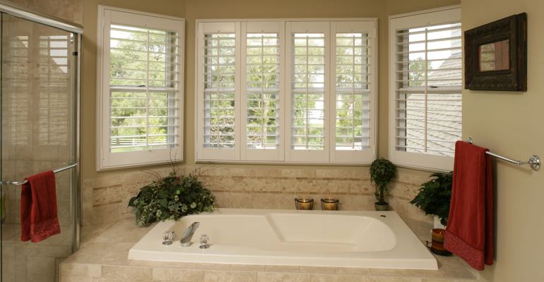 Plantation shutters in Cincinnati bathroom.